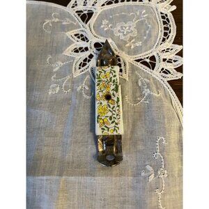 Vintage Butterfly Pattern Bottle Opener, has chips along sides